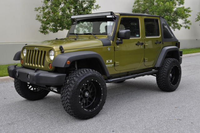 2007-2008-2009-2010-jeep-wrangler-unlimited-x-4x4-lifted-rescue-green-1.jpg